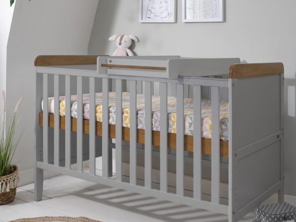 cot bed with mattress and top changer